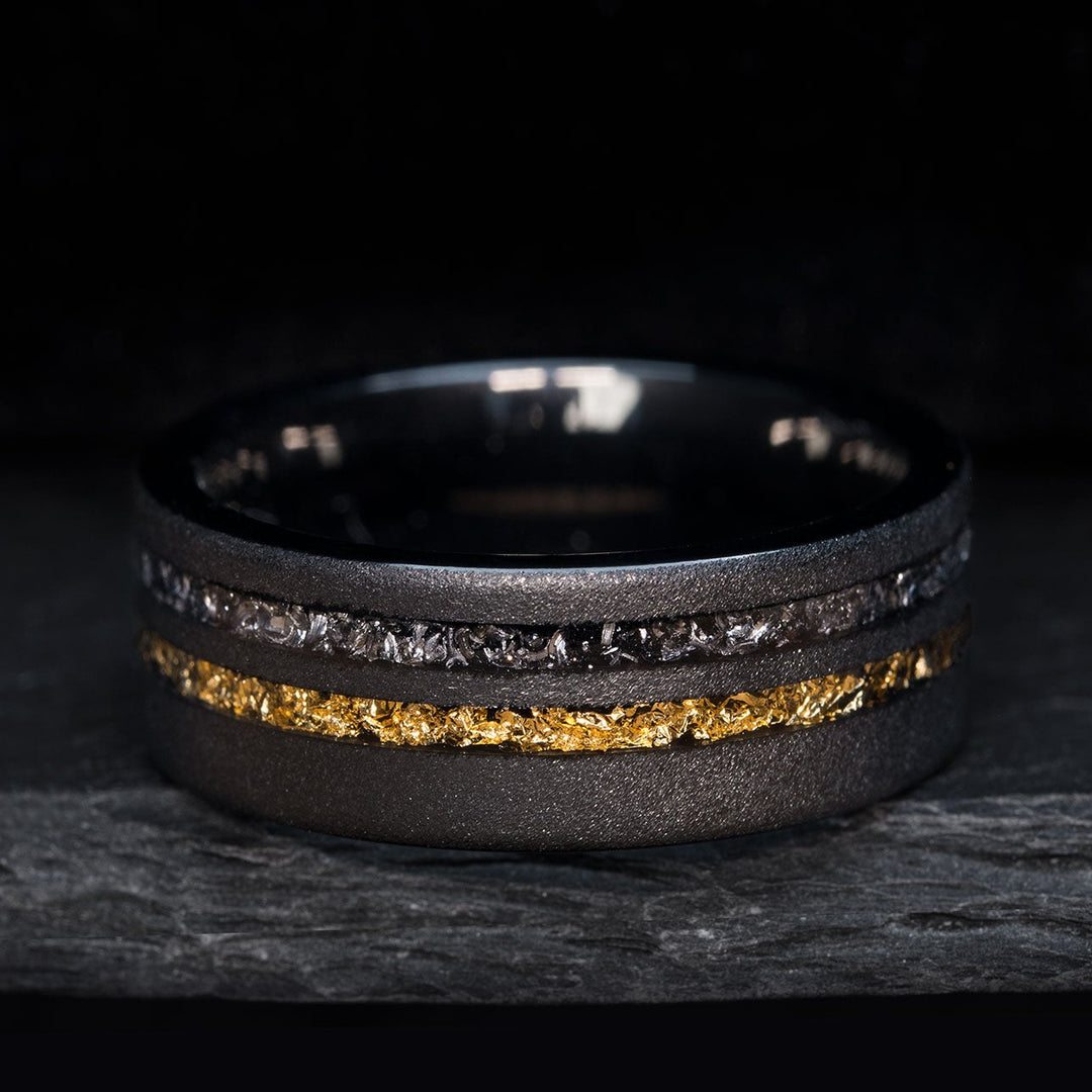 Black tungsten carbide ring with meteorite and gold inlay