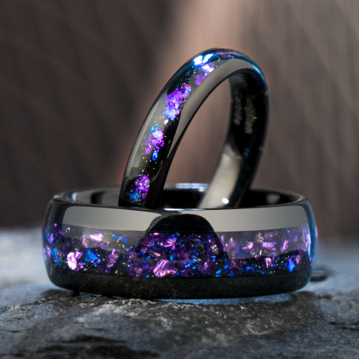 Two black tungsten rings with purple and blue alexandrite inlay
