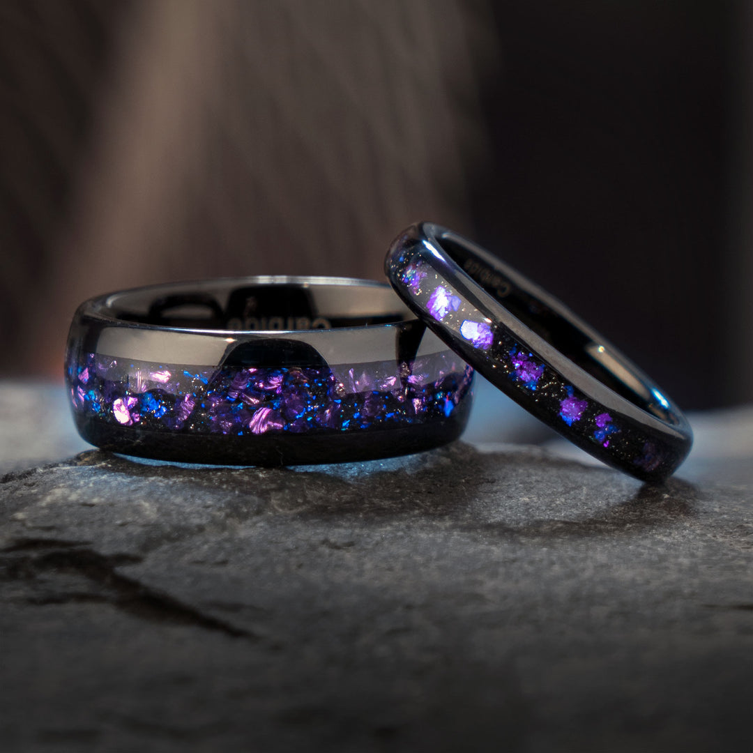 Black tungsten wedding rings with purple and blue alexandrite inlay