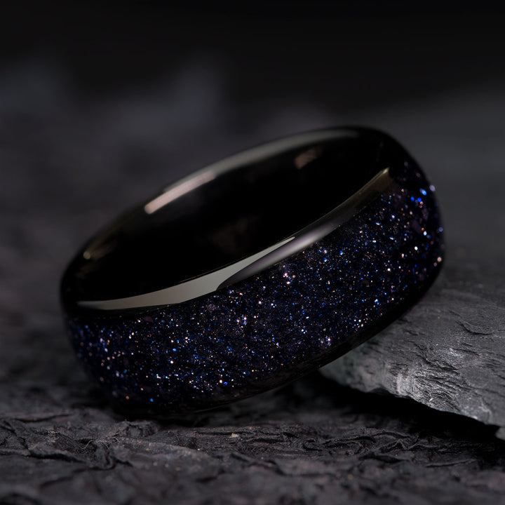 Black tungsten ring with starry blue sandstone inlay