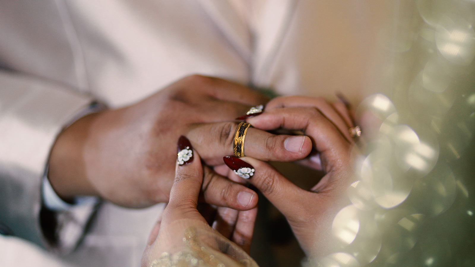 A man wearing Saga Bands Engagement Rings