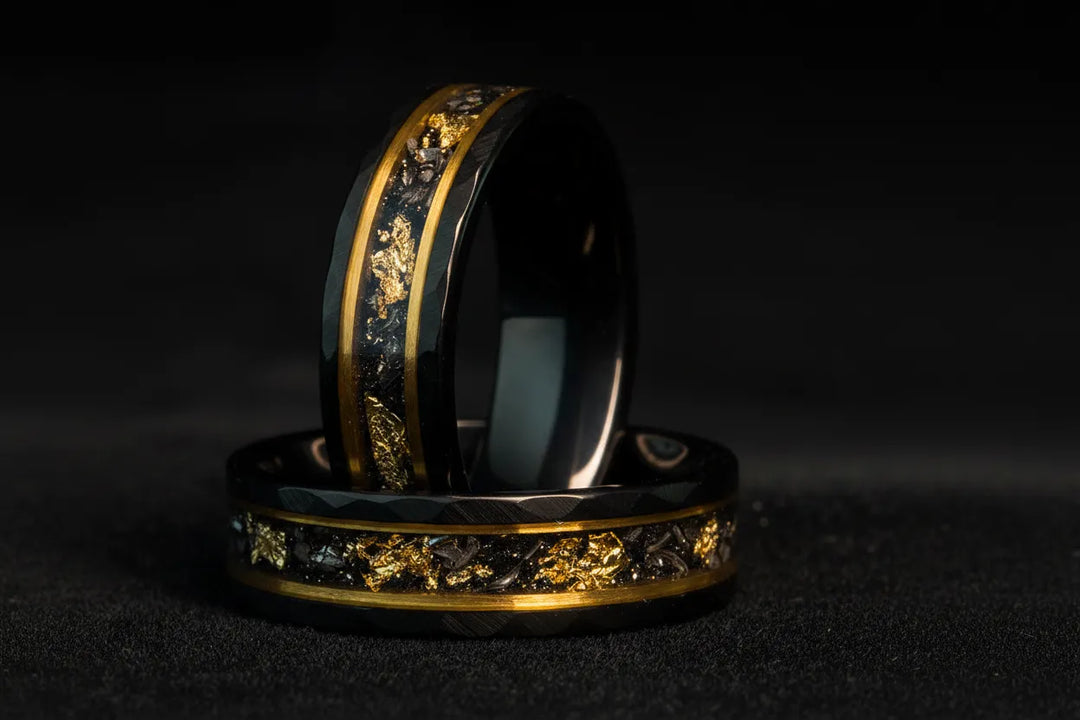 Polished mirror finish Sagabands ring with high shine reflecting light against dark background