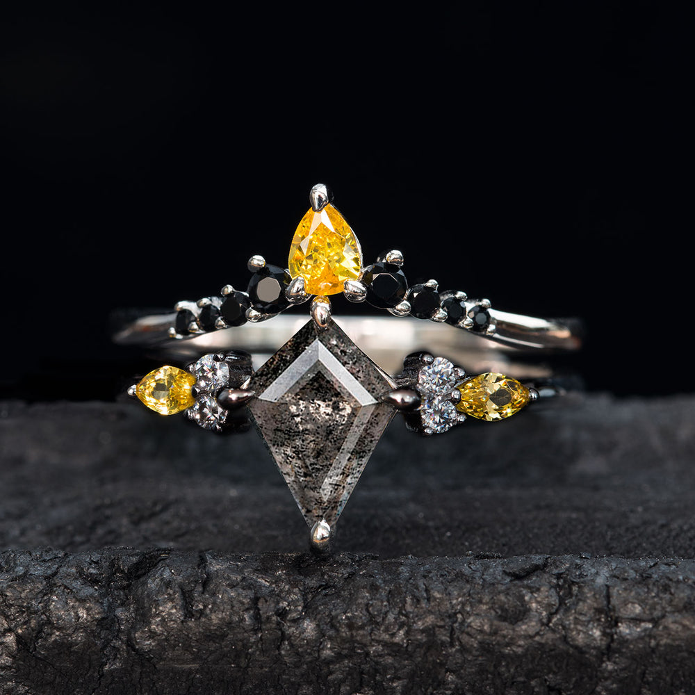 Sterling silver women's ring with kite salt & pepper diamond, pear-shaped salt & pepper diamonds, and black zircons.