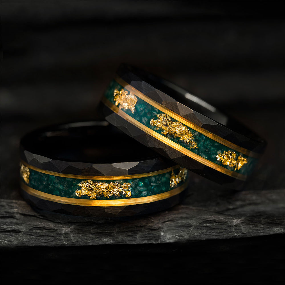 THE GUARDIAN WINGS men's hammered black tungsten wedding bands with green moss agate, gold stripes, and 22k gold leaf.