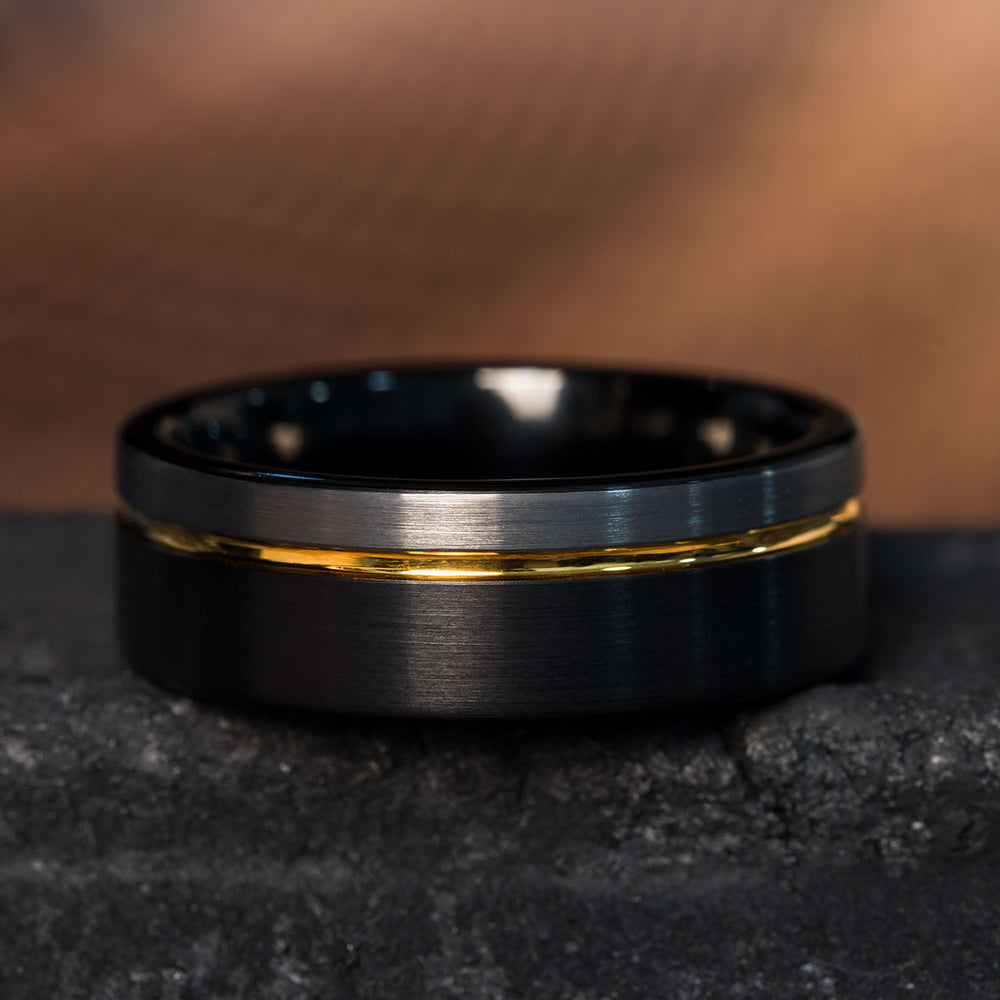 8mm tri-color tungsten wedding band with brushed black, silver, and gold stripes.