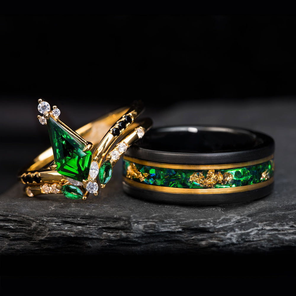 The Venom ring set: black tungsten with opal & gold leaf, and gold band with kite emerald, diamonds & zircons.