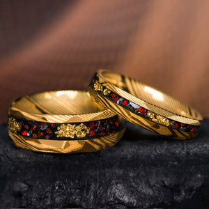 THE ARCHMAGE custom wedding ring: black, gold Damascus steel, fire opal, meteorite, gold leaf.