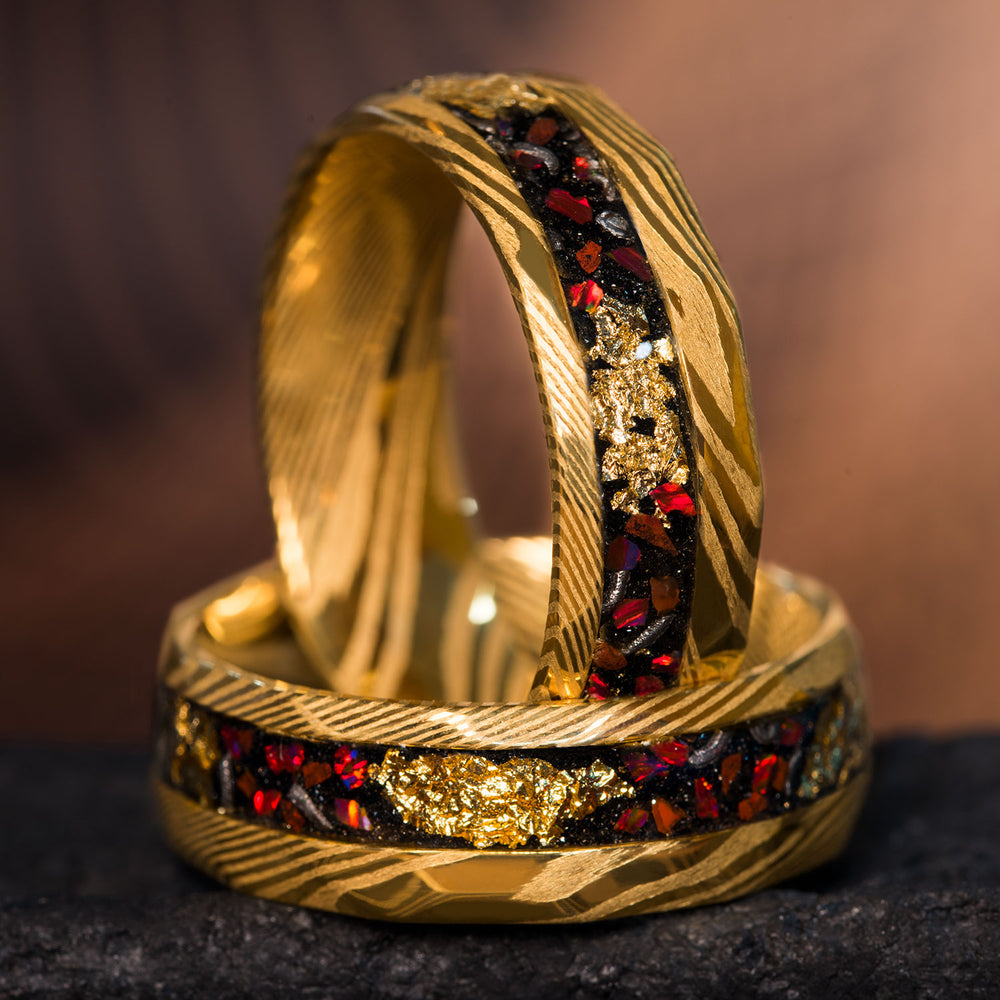 THE ARCHMAGE ring, Gold Hammered Damascus Steel with meteorite, fire opal, and 22K gold leaf inlay.