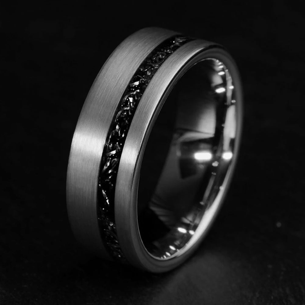 Brushed silver tungsten carbide ring with textured Gibeon meteorite inlay, showing product appearance on product page.