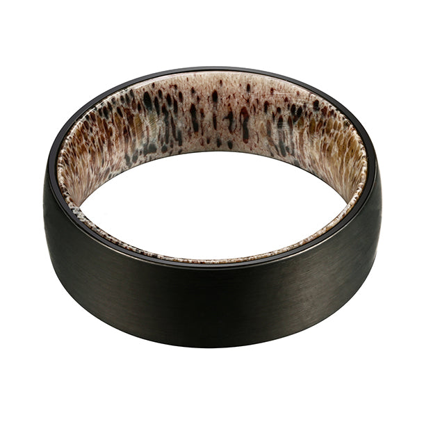 Black tungsten ring with brushed finish and speckled antler inlay, beveled edge. Product shot.