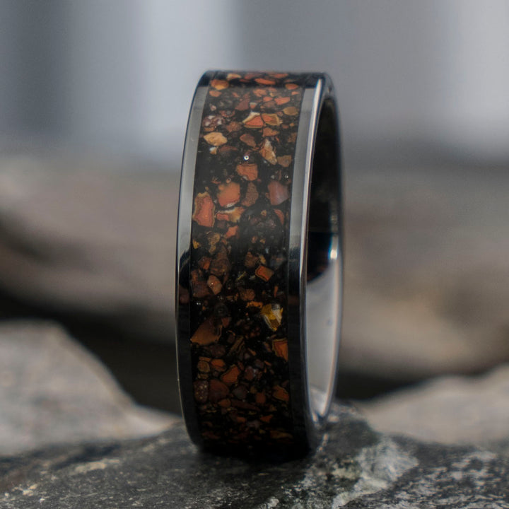 Close-up of THE JURASSIC ring, showcasing T-Rex fossil inlay
