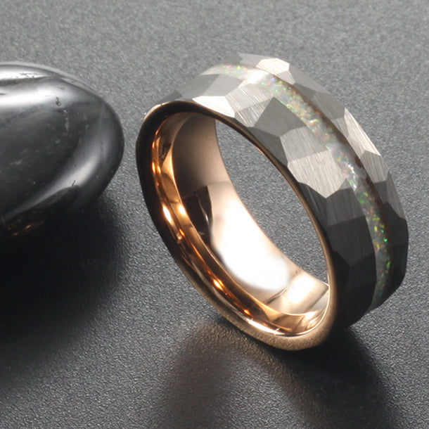 Hammered tungsten ring with opal inlay and rose gold interior