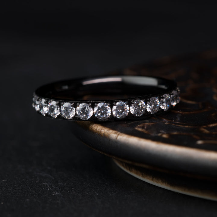 Black titanium ring with cubic zirconia accents
