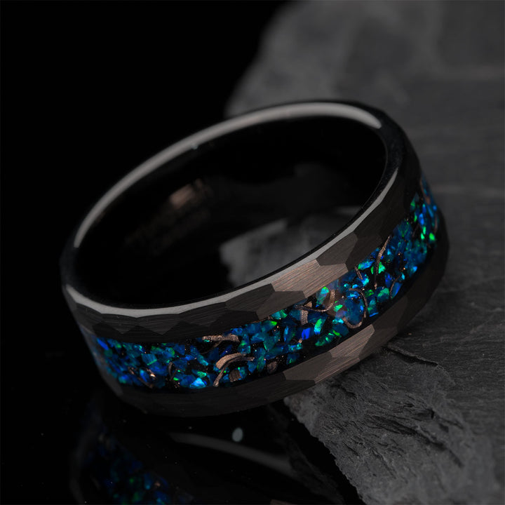 Hammered black tungsten ring with blue opal inlay