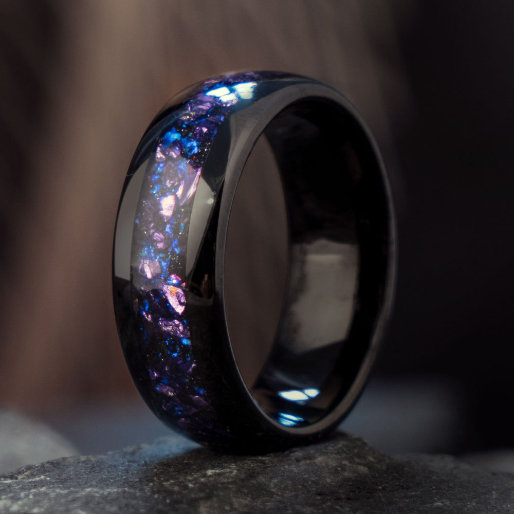 THE CAPRICORNUS black tungsten ring with purple and blue alexandrite nebula inlay for product page.