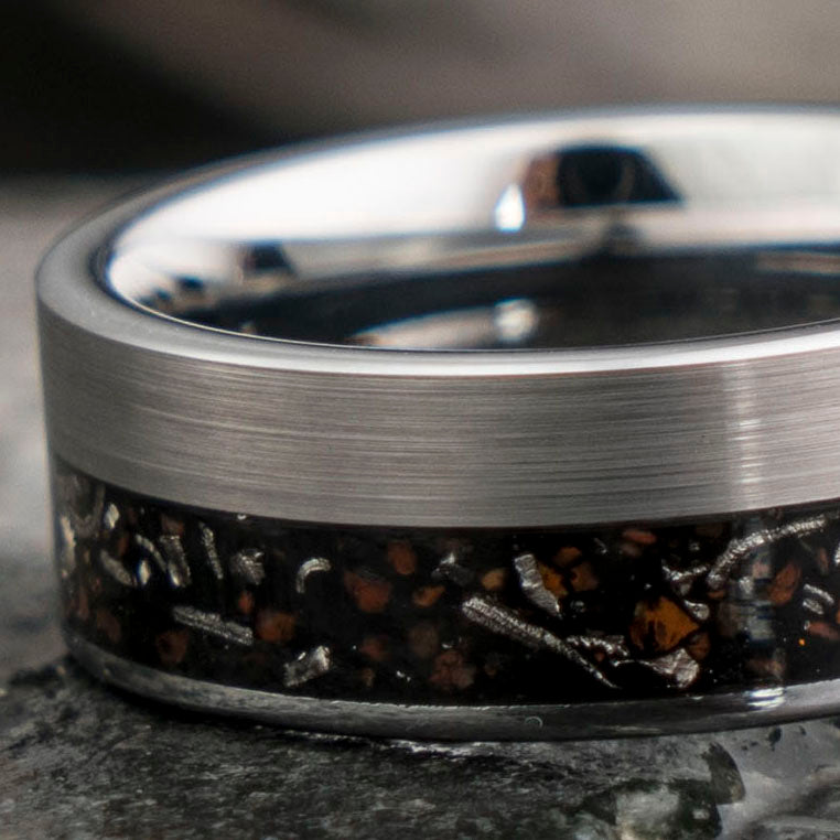 8mm brushed tungsten wedding band with meteorite and T-rex dinosaur bone inlay.