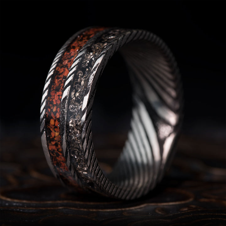 Damascus steel ring with dinosaur bone and meteorite inlay