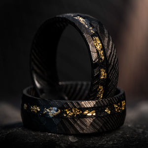 The Exorcist ring, black hammered Damascus steel with meteorite and gold leaf inlay