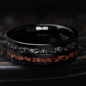 Black tungsten carbide ring with T-Rex bone and meteorite inlays, showcasing unique textures and colors.