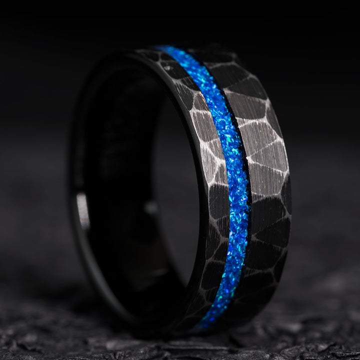 Black tungsten ring with blue opal inlay