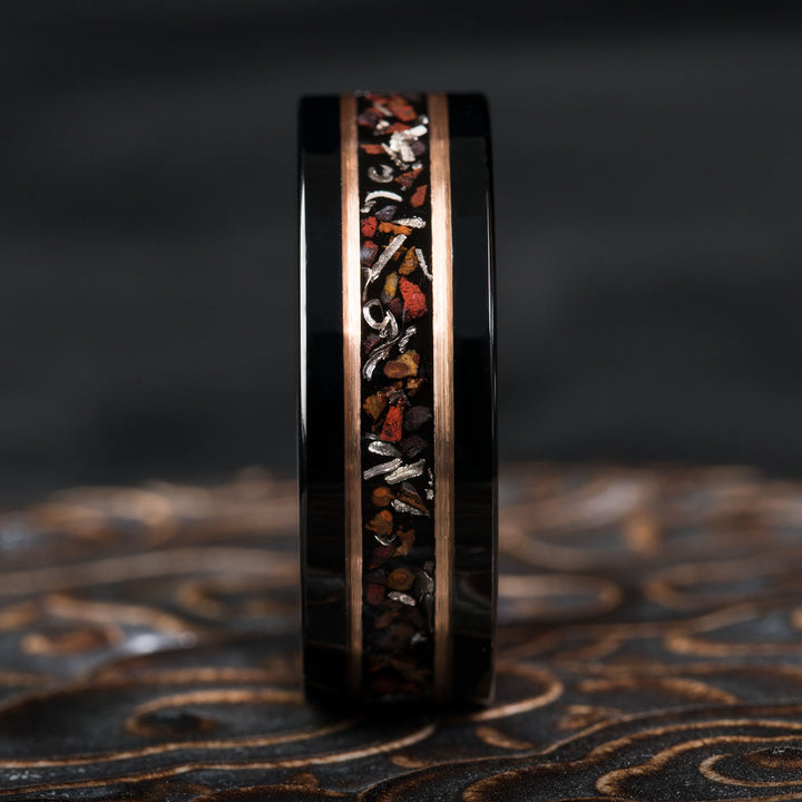 Black tungsten ring with meteorite and dinosaur bone inlay