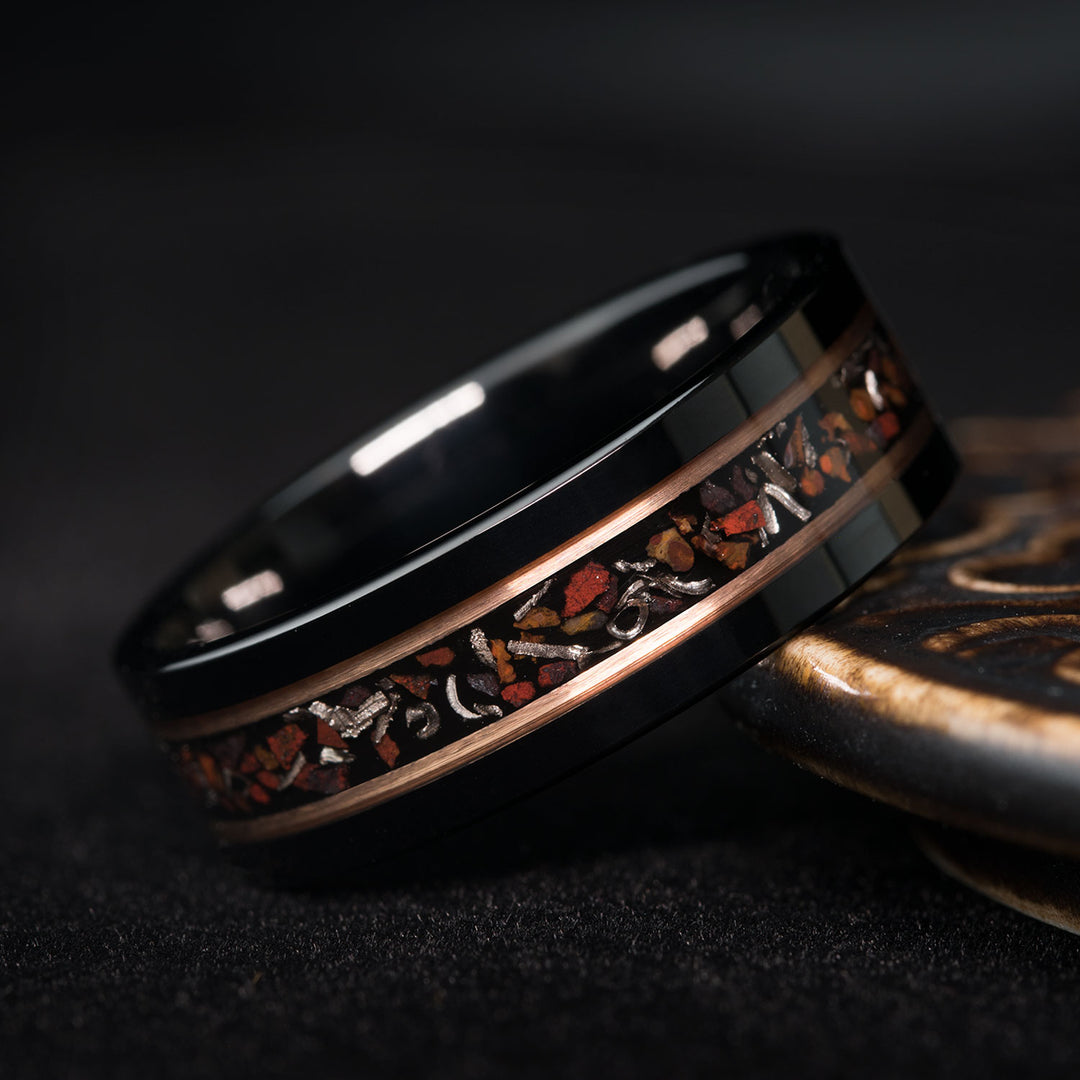 Black tungsten ring with meteorite and dinosaur bone inlay
