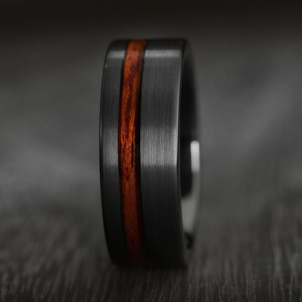 Black tungsten ring with vertical Koa wood inlay, matte finish, 8mm wide wedding band.