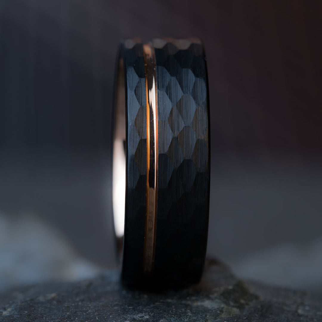 Hammered black tungsten ring with rose gold inlay detail