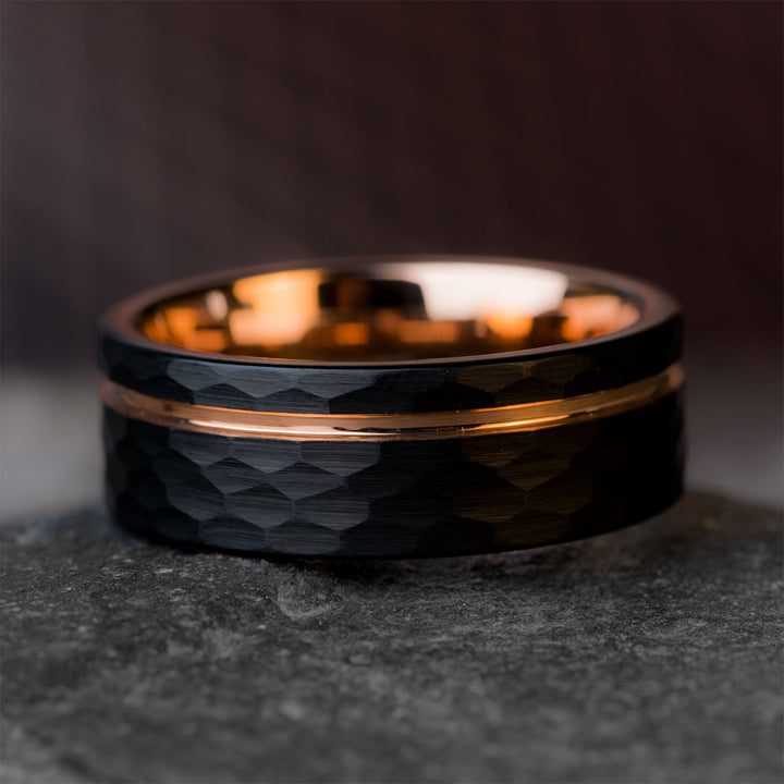 Black tungsten carbide ring with rose gold inlay