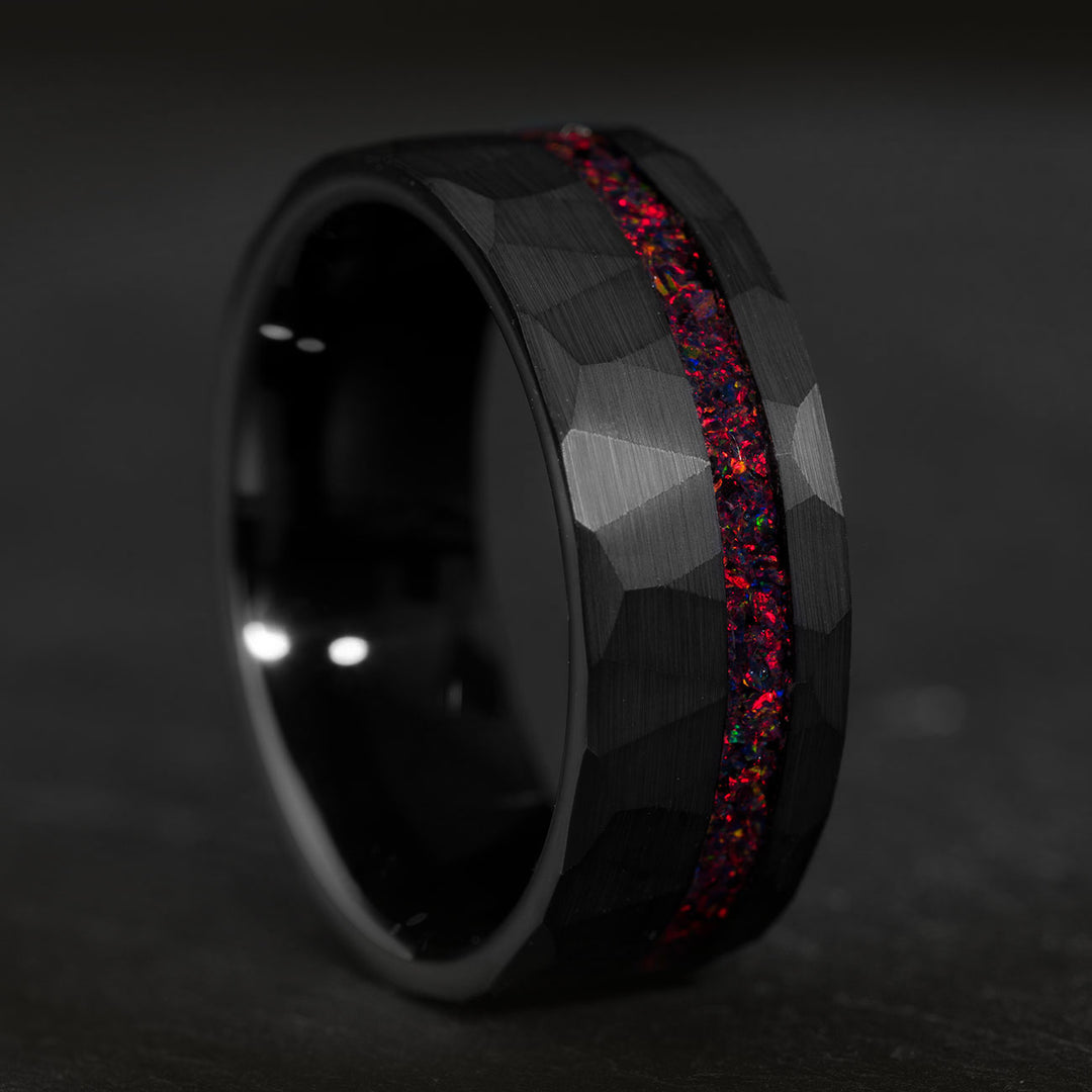 Black tungsten wedding ring with red starry sky opal inlay