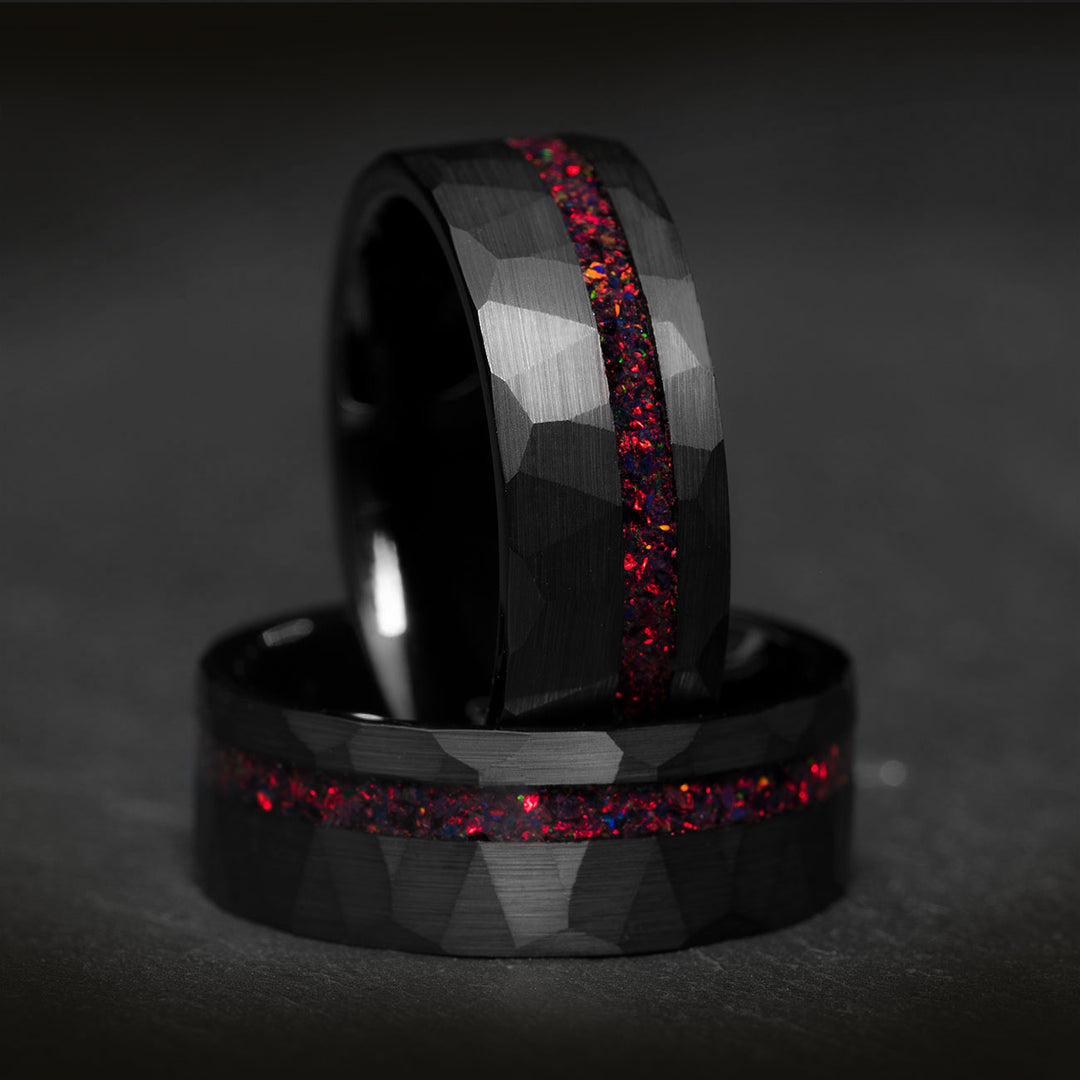 Hammered black tungsten ring with red opal inlay
