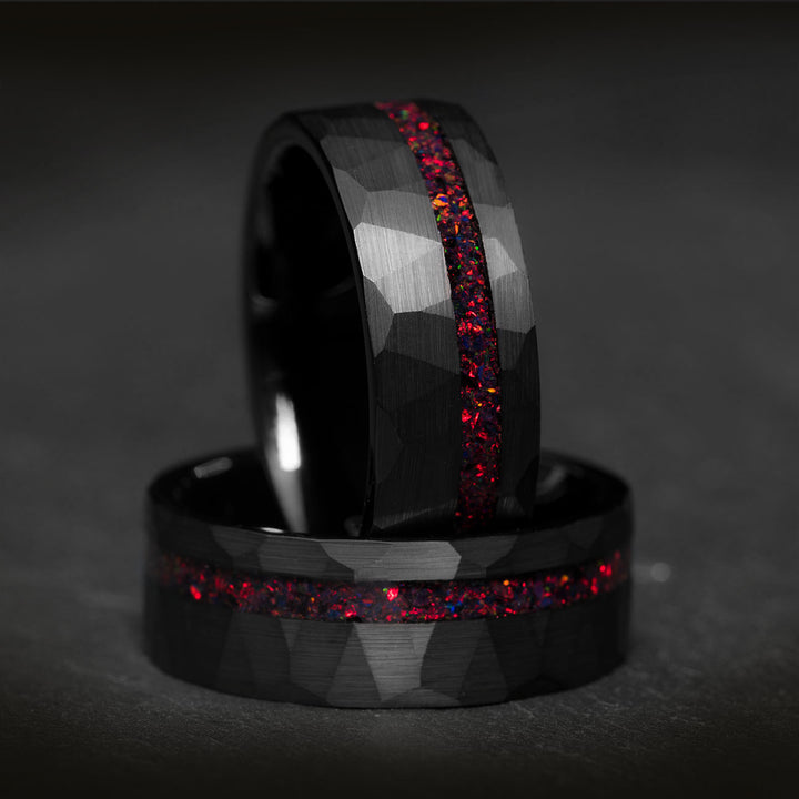 Hammered black tungsten ring with red opal inlay