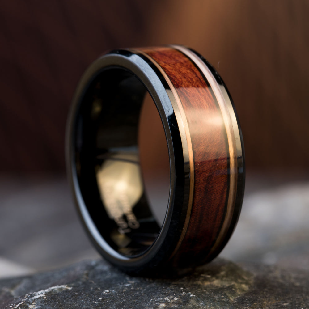THE REGENT black tungsten wedding ring, 8mm wide, with crimson ironwood inlay and rose gold trim on stone.