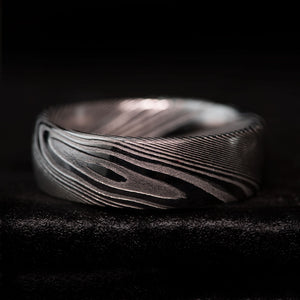 THE SAGE silver Damascus steel ring with unique swirled pattern and domed comfort fit.