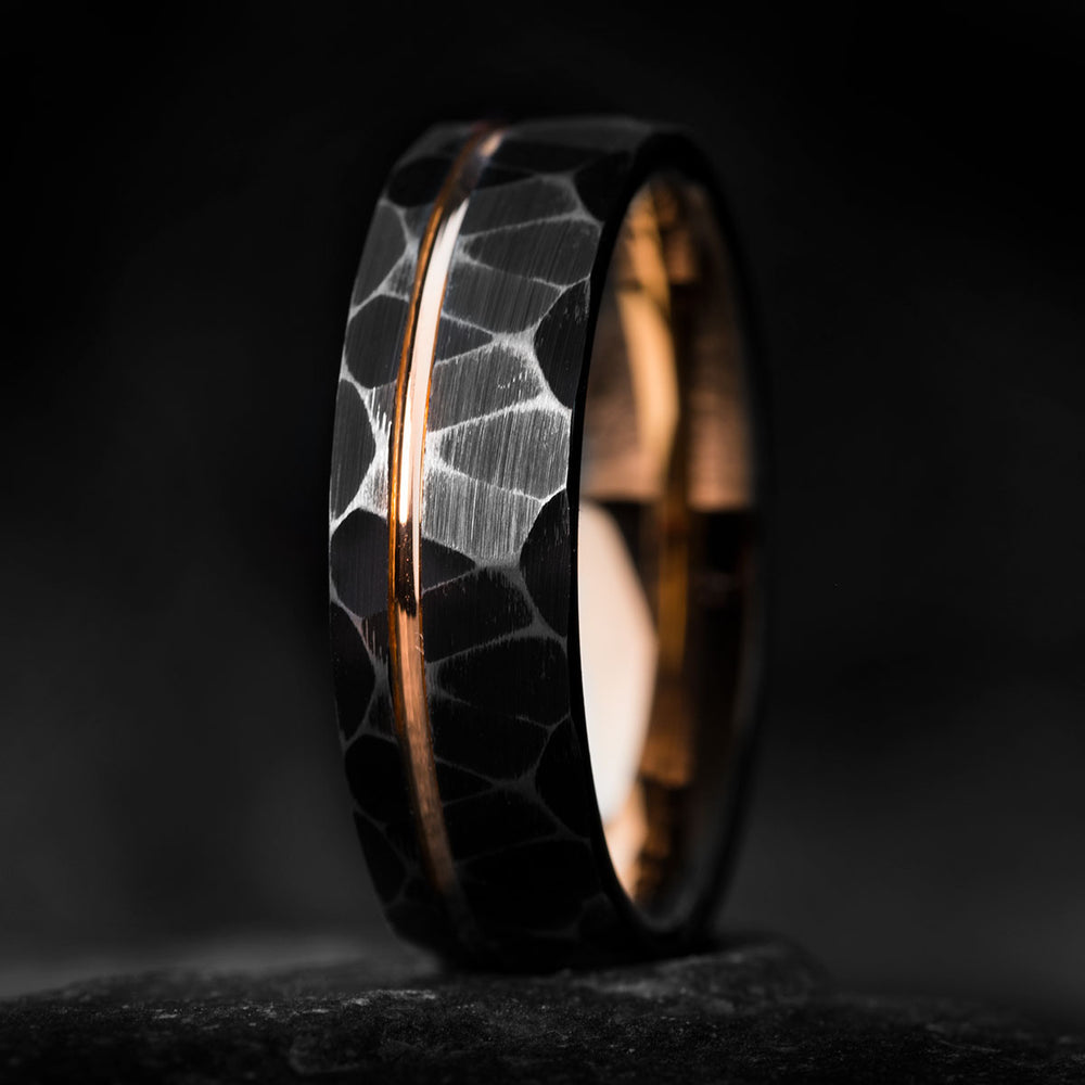 THE DARKSUN 8mm men's tungsten carbide band, hammered black, rose gold inlay.