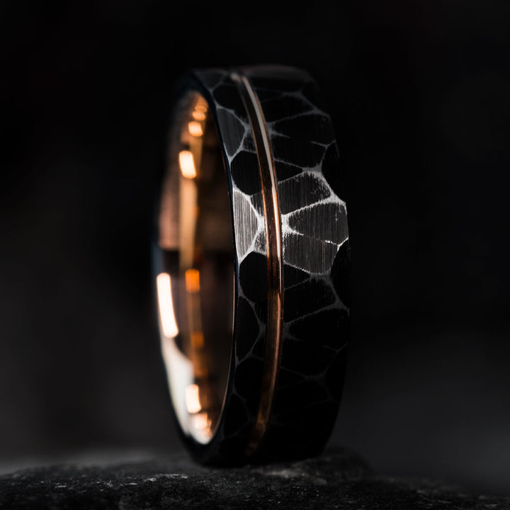 Rustic black tungsten wedding ring with rose gold inlay