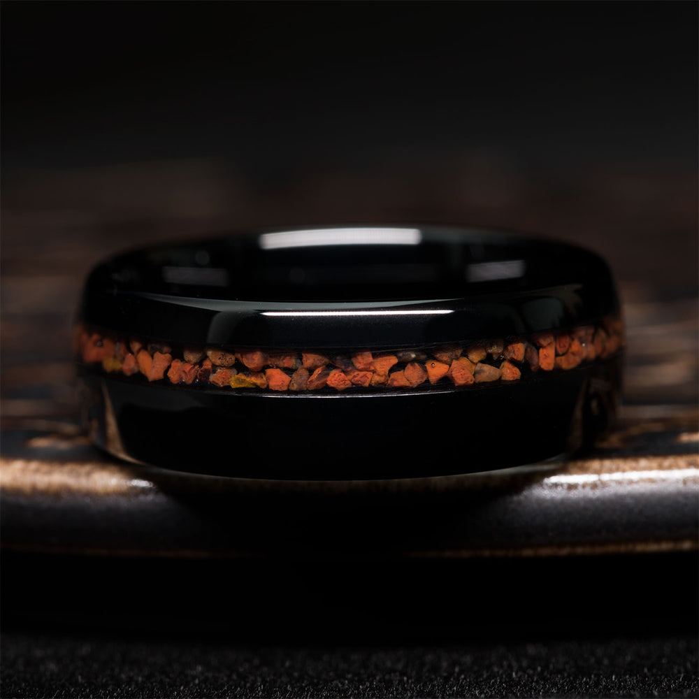Black Tungsten Carbide ring with orange Tyrannosaurus Rex bone inlay, 8mm dome design.