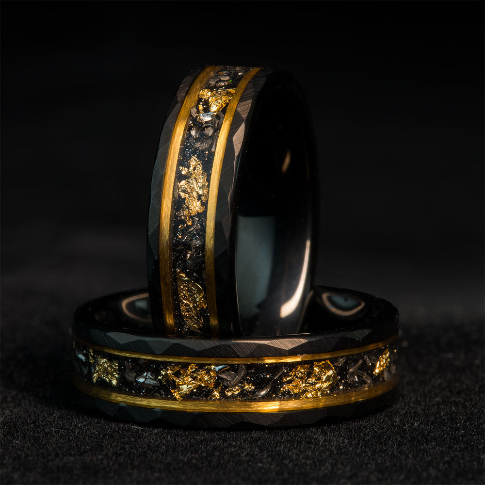 The Uncrowned King ring: black hammered tungsten with Muonionalusta meteorite and 22k gold leaf accents.