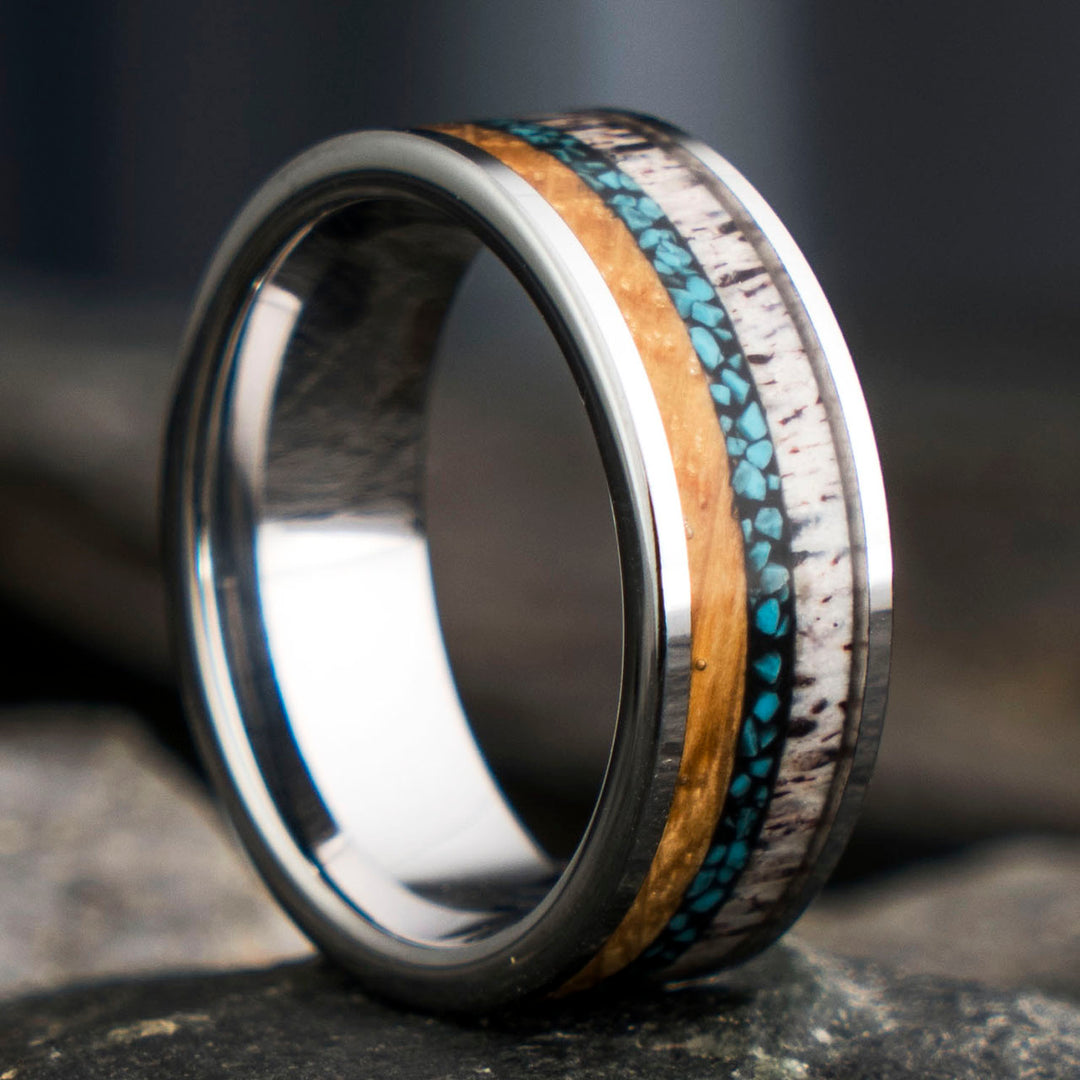 Tungsten ring with whiskey barrel, antler, and turquoise inlay