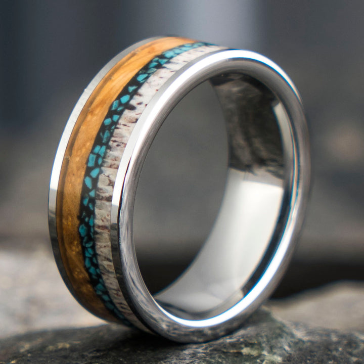 Silver tungsten ring with whiskey barrel, antler, and turquoise inlay