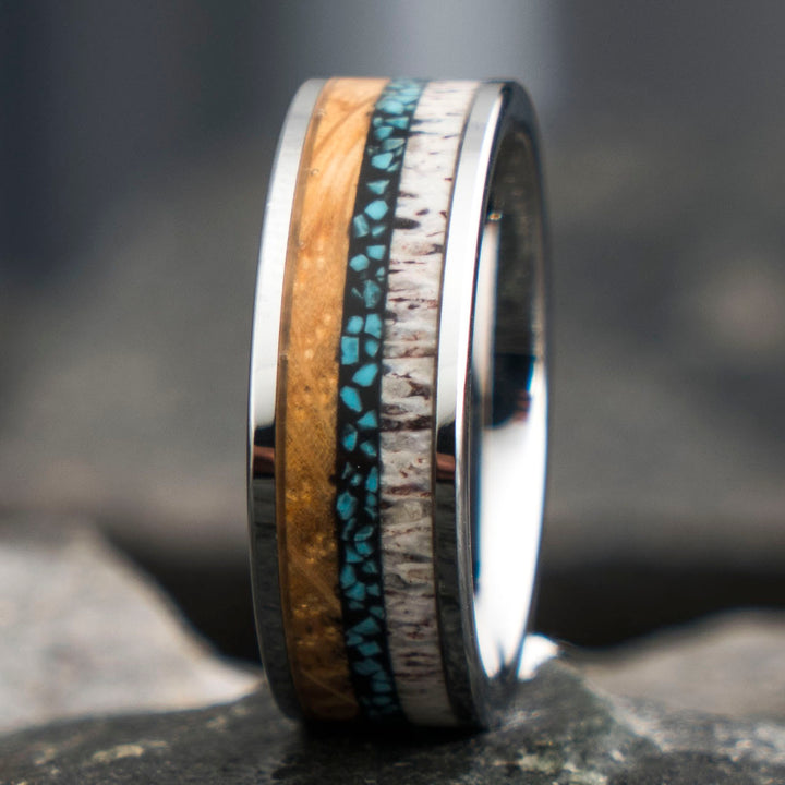 Tungsten ring with whiskey barrel, antler, and turquoise inlay