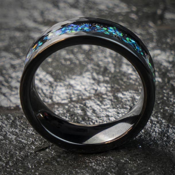Black tungsten ring with blue and green starry opal inlay