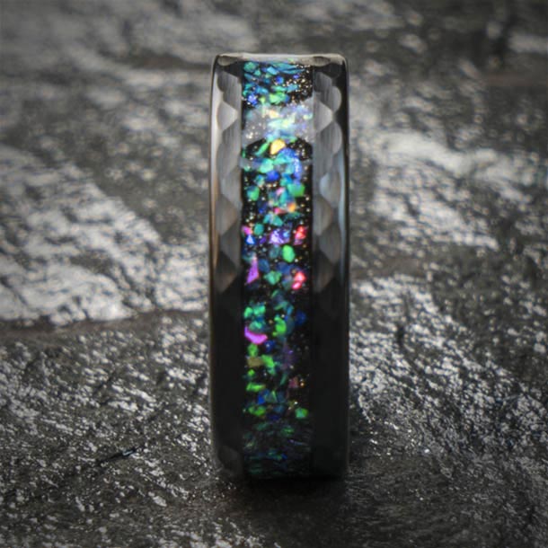 Black tungsten ring with starry opal inlay